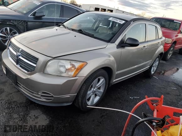 ✅ 2010 Dodge Caliber SXT • VIN: 1B3CB4HA7AD542543 • Лот: 85994744. Опубликован ранее на Copart с пробегом 60 541 миль. Бесплатный доступ к архиву аукционных продаж из США и подробный отчёт об истории автомобиля на DreamBid. Изображение 1.