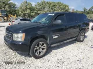 2013 Chevrolet Suburban LT z VIN 1GNSKJE79DR169165, wystawiony jako Copart lot #89437395 z przebiegiem 314 051 mil mil oraz Szkoda całkowita • Salvage title. Historia ofert i sprzedaży dostępna na DreamBid. Obrazek 1.