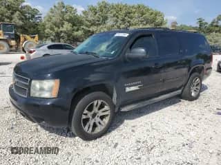 2013 Chevrolet Suburban LT with VIN 1GNSKJE79DR169165, listed as a Copart auction lot 89437395 with 314,051 mi miles and Salvage title. Bid and sale history available at DreamBid. Image 1.