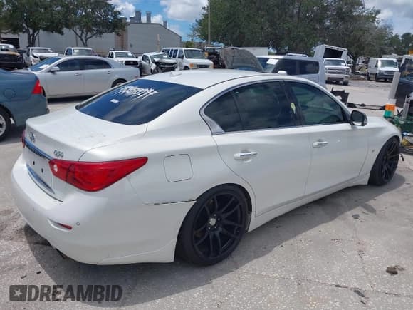✅ 2014 Infiniti Q50 Premium • VIN: JN1BV7APXEM674609 • Лот: 42501051. Опубликован ранее на IAAI с пробегом 93 998 миль. Бесплатный доступ к архиву аукционных продаж из США и подробный отчёт об истории автомобиля на DreamBid. Изображение 4.