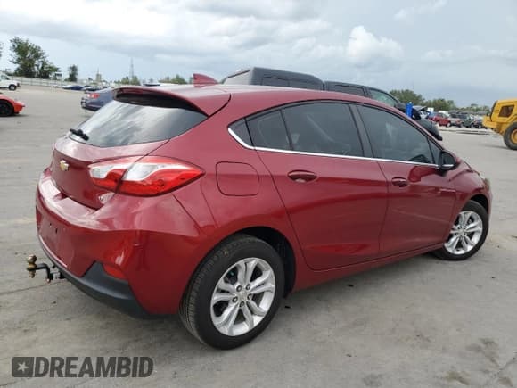 ✅ 2019 Chevrolet Cruze LT • VIN: 3G1BE6SM9KS601831 • Lot: 56832693. Listed on Copart with 55,257 mi. Free auction sales archive from the USA and detailed vehicle history report at DreamBid. Image 3.