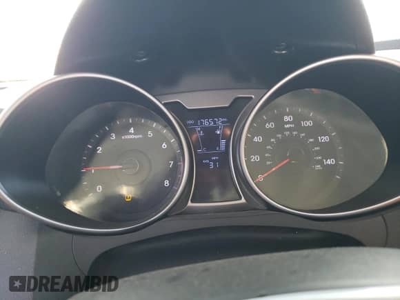 2013 Hyundai Veloster w/Gray Int z VIN KMHTC6AD7DU166325, wystawiony jako Copart lot #69826874 z przebiegiem 176 572 mil mil oraz Szkoda całkowita • Salvage title. Historia ofert i sprzedaży dostępna na DreamBid. Obrazek 9.