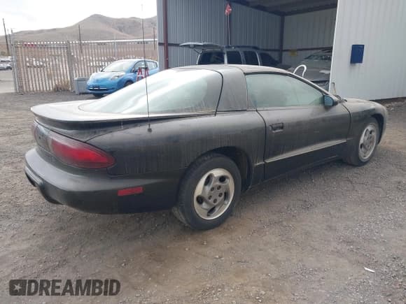 ✅ 1994 Pontiac Firebird Firebird • VIN: 2G2FS22S7R2215647 • Lot: 43680694. Listed on IAAI with 96,791 mi. Free auction sales archive from the USA and detailed vehicle history report at DreamBid. Image 4.