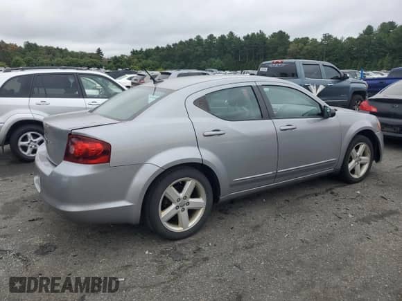 2013 Dodge Avenger SE с VIN 1C3CDZAB2DN712609, выставлен на аукционе Copart как лот 71402174 с пробегом 158 925 миль миль и Списание • Salvage title. История ставок и продаж доступна на DreamBid. Изображение 3.