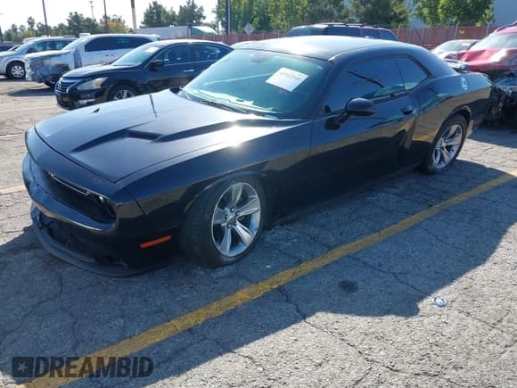 ✅ 2015 Dodge Challenger SXT • VIN: 2C3CDZAG1FH811459 • Lot: 43507040. Listed on IAAI with 121,268 mi. Free auction sales archive from the USA and detailed vehicle history report at DreamBid. Image 2.