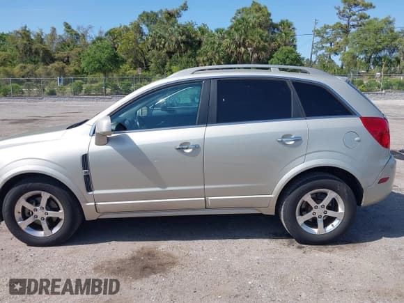 ✅ 2013 Chevrolet Captiva Sport LT • VIN: 3GNAL3EK4DS557197 • Lot: 42011329. Wystawiony na IAAI z przebiegiem 164 539 mil. Bezpłatny archiwum sprzedaży aukcyjnych z USA i szczegółowy raport historii pojazdu na DreamBid. Zdjęcie 14.