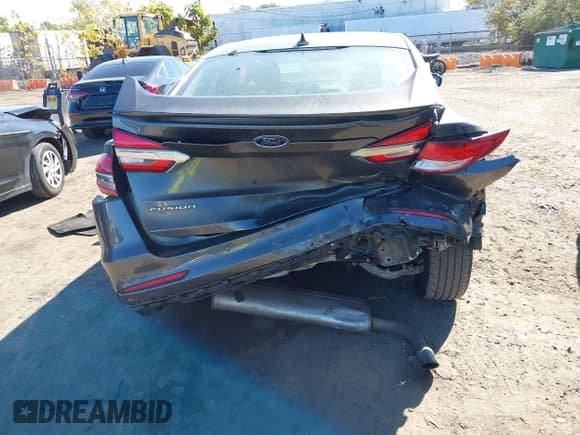 ✅ 2019 Ford Fusion SEL • VIN: 3FA6P0CD6KR285249 • Лот: 43456934. Опубликован ранее на IAAI с пробегом 82 587 миль. Бесплатный доступ к архиву аукционных продаж из США и подробный отчёт об истории автомобиля на DreamBid. Изображение 6.