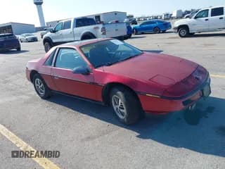 ✅ 1987 Pontiac Fiero • VIN: 1G2PE11R3HP239147 • Lot: 42533471. Wystawiony na IAAI z przebiegiem 71 459 mil. Bezpłatny archiwum sprzedaży aukcyjnych z USA i szczegółowy raport historii pojazdu na DreamBid. Zdjęcie 1.