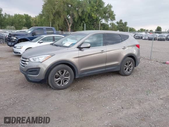 2015 Hyundai Santa Fe with VIN 5XYZTDLB3FG250726, listed as a IAAI auction lot 43108562 with 178,355 mi miles and . Bid and sale history available at DreamBid. Image 2.