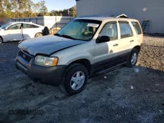 ✅ 2004 Ford Escape XLS • VIN: 1FMCU02114KB42371 • Lot: 86196385. Listed on Copart with 227,801 mi. Free auction sales archive from the USA and detailed vehicle history report at DreamBid. Image 1.