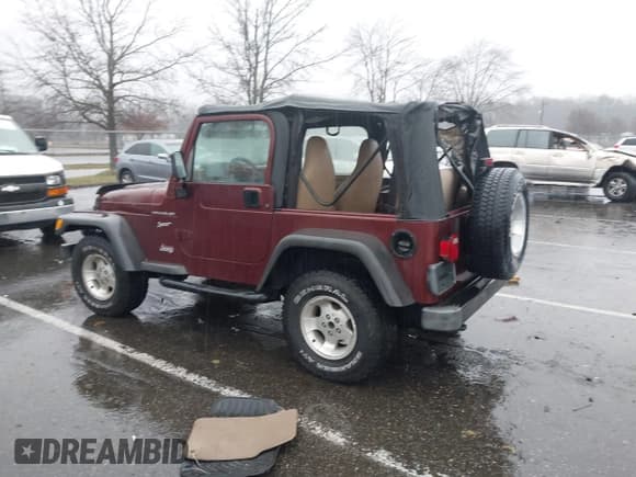 ✅ 2002 Jeep Wrangler Sport • VIN: 1J4FA49S92P722929 • Лот: 43842426. Опубликован ранее на IAAI с пробегом 179 784 миль. Бесплатный доступ к архиву аукционных продаж из США и подробный отчёт об истории автомобиля на DreamBid. Изображение 3.