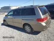 ✅ 2010 Honda Odyssey EX-L • VIN: 5FNRL3H67AB076181 • Лот: 87393285. Опубликован ранее на Copart с пробегом 223 916 миль. Бесплатный доступ к архиву аукционных продаж из США и подробный отчёт об истории автомобиля на DreamBid. Изображение 2.
