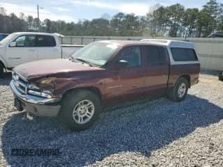 2001 Dodge Dakota Sport с VIN 1B7GL2ANX1S102505, выставлен на аукционе Copart как лот 47586155 с пробегом 242 272 миль миль и Списание • Salvage title. История ставок и продаж доступна на DreamBid. Изображение 1.