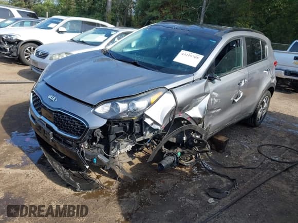 ✅ 2021 Kia Sportage EX • VIN: KNDPNCAC3M7909678 • Lot: 43219705. Wystawiony na IAAI z przebiegiem 96 833 mil. Bezpłatny archiwum sprzedaży aukcyjnych z USA i szczegółowy raport historii pojazdu na DreamBid. Zdjęcie 2.