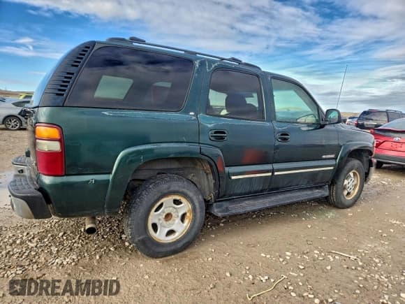 ✅ 2002 Chevrolet Tahoe LT • VIN: 1GNEK13ZX2J334640 • Lot: 95347455. Listed on Copart with 243,855 mi. Free auction sales archive from the USA and detailed vehicle history report at DreamBid. Image 3.