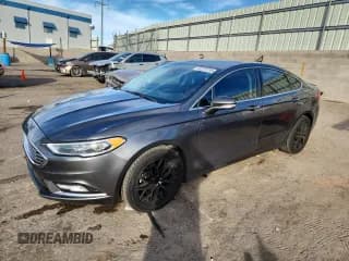 ✅ 2017 Ford Fusion Titanium • VIN: 3FA6P0K94HR176987 • Lot: 91251255. Listed on Copart with 106,990 mi. Free auction sales archive from the USA and detailed vehicle history report at DreamBid. Image 1.