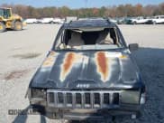 ✅ 1995 Jeep Grand Cherokee Laredo • VIN: 1J4GZ58S1SC502051 • Лот: 43733265. Опубликован ранее на IAAI с пробегом 240 806 миль. Бесплатный доступ к архиву аукционных продаж из США и подробный отчёт об истории автомобиля на DreamBid. Изображение 6.