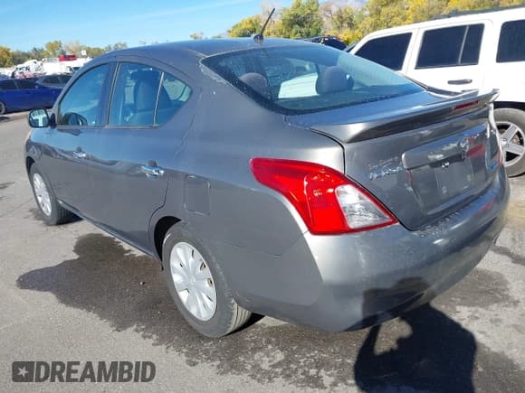 ✅ 2014 Nissan Versa SV • VIN: 3N1CN7AP4EL807590 • Lot: 43526051. Listed on IAAI with 134,190 mi. Free auction sales archive from the USA and detailed vehicle history report at DreamBid. Image 3.
