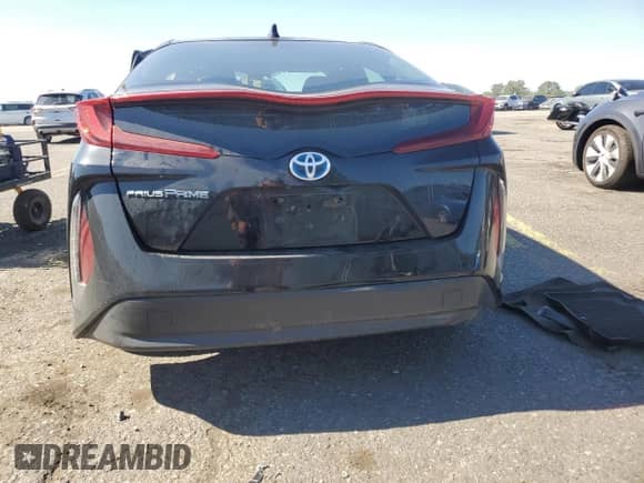 2021 Toyota Prius LE с VIN JTDKAMFP9M3170900, выставлен на аукционе Copart как лот 84271525 с пробегом 24 578 миль миль и Списание • Salvage title. История ставок и продаж доступна на DreamBid. Изображение 6.
