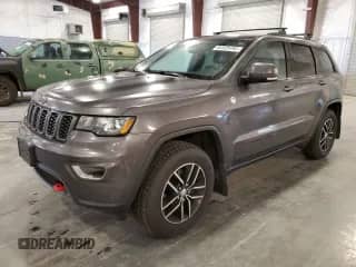 2017 Jeep Grand Cherokee Trailhawk with VIN 1C4RJFLG0HC610281, listed as a Copart auction lot 82325495 with 140,671 mi miles and Clean title. Bid and sale history available at DreamBid. Image 1.