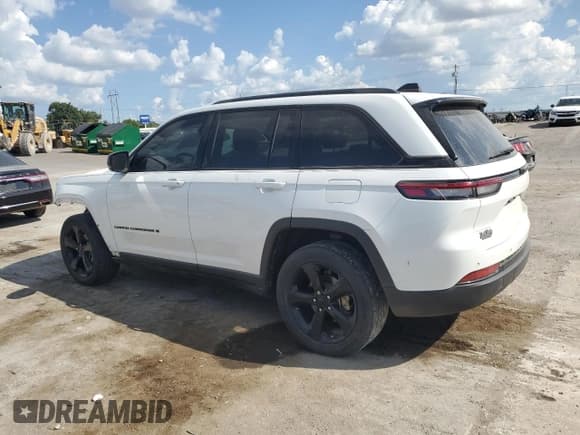 ✅ 2023 Jeep Grand Cherokee Altitude • VIN: 1C4RJGAG5PC510037 • Lot: 69645445. Listed on Copart with 59,419 mi. Free auction sales archive from the USA and detailed vehicle history report at DreamBid. Image 2.