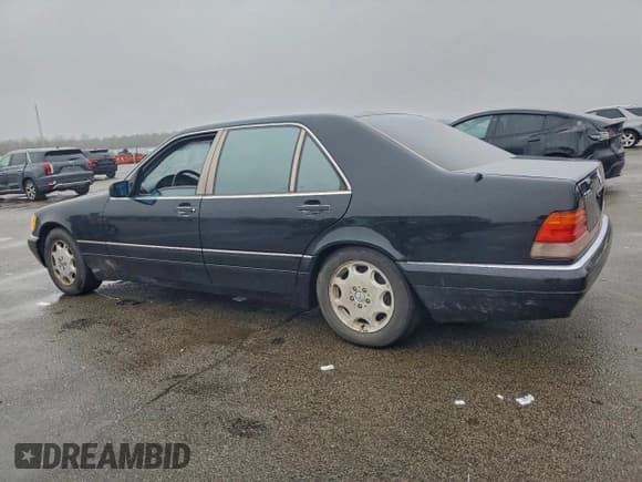 ✅ 1996 Mercedes-Benz S • VIN: WDBGA51E5TA295340 • Лот: 94701385. Опубликован ранее на Copart с пробегом 179 643 миль. Бесплатный доступ к архиву аукционных продаж из США и подробный отчёт об истории автомобиля на DreamBid. Изображение 2.