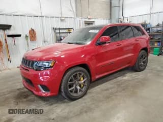 ✅ 2020 Jeep Grand Cherokee • VIN: 100000000016946WI • Lot: 58916695. Listed on Copart with 27,469 mi. Free auction sales archive from the USA and detailed vehicle history report at DreamBid. Image 1.