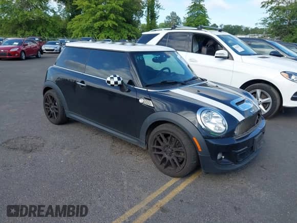 2013 MINI Hardtop S with VIN WMWSV3C53DT477574, listed as a IAAI auction lot 42385383 with 81,312 mi miles and . Bid and sale history available at DreamBid. Image 1.