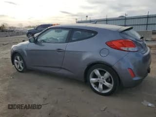 ✅ 2013 Hyundai Veloster w/Gray Int • VIN: KMHTC6AD6DU179969 • Lot: 76845334. Wystawiony na Copart z przebiegiem 131 324 mil. Bezpłatny archiwum sprzedaży aukcyjnych z USA i szczegółowy raport historii pojazdu na DreamBid. Zdjęcie 2.