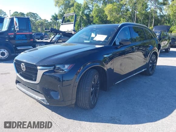 ✅ 2024 Mazda CX-90 S Premium Plus • VIN: JM3KKEHC2R1174732 • Lot: 43597887. Listed on IAAI with 19,366 mi. Free auction sales archive from the USA and detailed vehicle history report at DreamBid. Image 2.