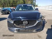 ✅ 2021 Mazda CX-5 Touring • VIN: JM3KFACM5M1354857 • Lot: 89668295. Wystawiony na Copart z przebiegiem 55 797 mil. Bezpłatny archiwum sprzedaży aukcyjnych z USA i szczegółowy raport historii pojazdu na DreamBid. Zdjęcie 5.
