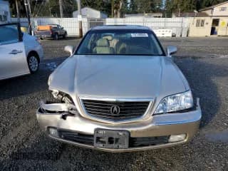 ✅ 1999 Acura RL • VIN: JH4KA9652XC007679 • Лот: 76130054. Опубликован ранее на Copart с пробегом Не указан. Бесплатный доступ к архиву аукционных продаж из США и подробный отчёт об истории автомобиля на DreamBid. Изображение 5.