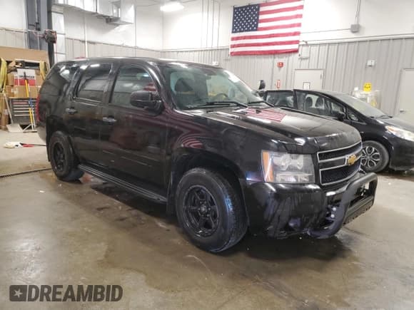 ✅ 2012 Chevrolet Tahoe Commercial • VIN: 1GNLC2E09CR174181 • Lot: 63186345. Listed on Copart with 182,110 mi. Free auction sales archive from the USA and detailed vehicle history report at DreamBid. Image 4.