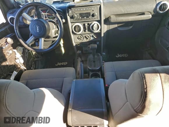 ✅ 2008 Jeep Wrangler Unlimited Sahara • VIN: 1J8GA59148L553239 • Lot: 94098485. Listed on Copart with 136,730 mi. Free auction sales archive from the USA and detailed vehicle history report at DreamBid. Image 8.