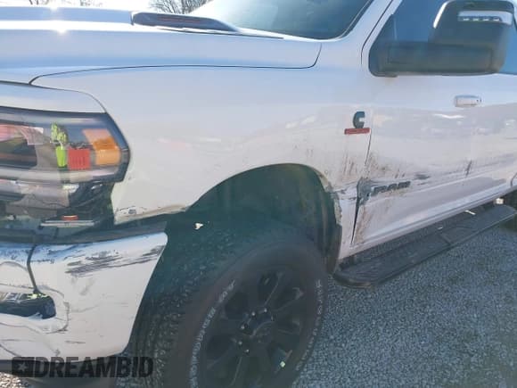 ✅ 2023 Ram 2500 Laramie • VIN: 3C6UR5FLXPG590582 • Lot: 41684629. Listed on IAAI with 17,304 mi. Free auction sales archive from the USA and detailed vehicle history report at DreamBid. Image 17.