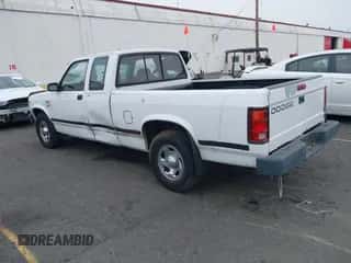 1995 Dodge Dakota z VIN 1B7GL23Y4SW935962, wystawiony jako IAAI lot #43144194 z przebiegiem 164 199 mil mil oraz . Historia ofert i sprzedaży dostępna na DreamBid. Obrazek 3.