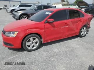 ✅ 2012 Volkswagen Jetta TDI w/Premium & Nav • VIN: 3VWLL7AJ3CM317841 • Lot: 52801825. Listed on Copart with 166,366 mi. Free auction sales archive from the USA and detailed vehicle history report at DreamBid. Image 1.