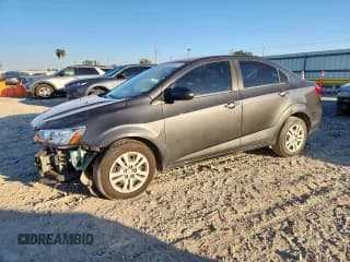 ✅ 2019 Chevrolet Sonic LS • VIN: 1G1JB5SB3K4107445 • Lot: 92170175. Listed on Copart with 117,395 mi. Free auction sales archive from the USA and detailed vehicle history report at DreamBid. Image 1.