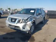 ✅ 2016 Nissan Frontier Pro-4X • VIN: 1N6AD0EV4GN771911 • Lot: 42955470. Listed on IAAI with 113,355 mi. Free auction sales archive from the USA and detailed vehicle history report at DreamBid. Image 2.