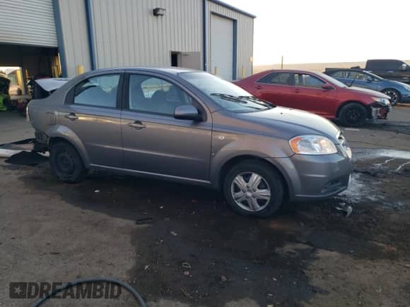 2007 Chevrolet Aveo LS z VIN KL1TD56677B075195, wystawiony jako Copart lot #84818114 z przebiegiem 98 549 mil mil oraz Szkoda całkowita • Salvage title. Historia ofert i sprzedaży dostępna na DreamBid. Obrazek 4.