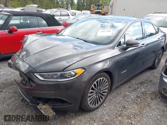 ✅ 2017 Ford Fusion Hybrid Titanium • VIN: 3FA6P0RU5HR301716 • Lot: 42017600. Listed on IAAI with 147,232 mi. Free auction sales archive from the USA and detailed vehicle history report at DreamBid. Image 2.