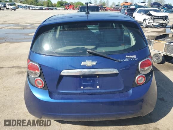 ✅ 2012 Chevrolet Sonic LTZ • VIN: 1G1JE6SH2C4211444 • Lot: 54013075. Listed on Copart with 97,378 mi. Free auction sales archive from the USA and detailed vehicle history report at DreamBid. Image 6.