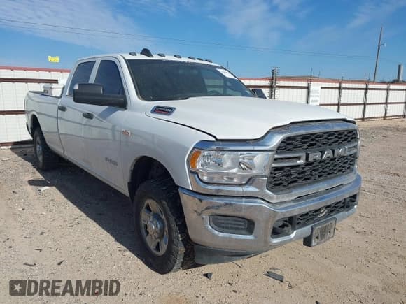 ✅ 2021 Ram 2500 Tradesman • VIN: 3C6UR5HJ2MG607169 • Лот: 41609408. Опубликован ранее на IAAI с пробегом 127 353 миль. Бесплатный доступ к архиву аукционных продаж из США и подробный отчёт об истории автомобиля на DreamBid. Изображение 1.