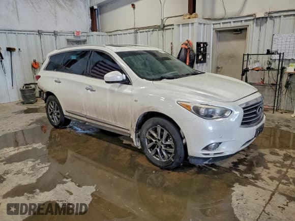 ✅ 2015 Infiniti QX60 • VIN: 5N1AL0MM5FC525891 • Lot: 94080265. Listed on Copart with 167,853 mi. Free auction sales archive from the USA and detailed vehicle history report at DreamBid. Image 4.