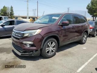 ✅ 2017 Honda Pilot EX-L • VIN: 5FNYF5H89HB039191 • Lot: 64782315. Listed on Copart with 121,465 mi. Free auction sales archive from the USA and detailed vehicle history report at DreamBid. Image 1.