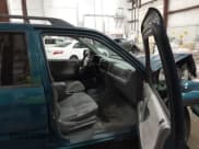 ✅ 1998 Isuzu Rodeo S • VIN: 4S2CK58W4W4337404 • Lot: 43075464. Listed on IAAI with 235,177 mi. Free auction sales archive from the USA and detailed vehicle history report at DreamBid. Image 5.