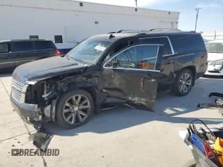 ✅ 2015 Chevrolet Suburban LTZ • VIN: 1GNSKKKC6FR544150 • Lot: 74838034. Wystawiony na Copart z przebiegiem Nie podano. Bezpłatny archiwum sprzedaży aukcyjnych z USA i szczegółowy raport historii pojazdu na DreamBid. Zdjęcie 1.