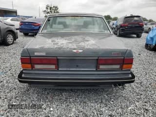 ✅ 1995 Bentley Turbo R • VIN: SCBZR03C4SCX55577 • Lot: 59091635. Wystawiony na Copart z przebiegiem 147 267 mil. Bezpłatny archiwum sprzedaży aukcyjnych z USA i szczegółowy raport historii pojazdu na DreamBid. Zdjęcie 6.