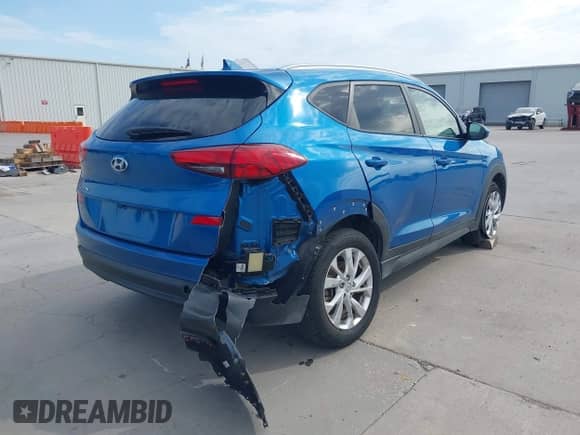 2019 Hyundai Tucson Value with VIN KM8J33A44KU957253, listed as a IAAI auction lot 42887799 with 57,676 mi miles and . Bid and sale history available at DreamBid. Image 4.