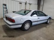 ✅ 1990 Ford Thunderbird • VIN: 1FAPP6047LH140817 • Лот: 83910194. Опубликован ранее на Copart с пробегом 177 909 миль. Бесплатный доступ к архиву аукционных продаж из США и подробный отчёт об истории автомобиля на DreamBid. Изображение 3.